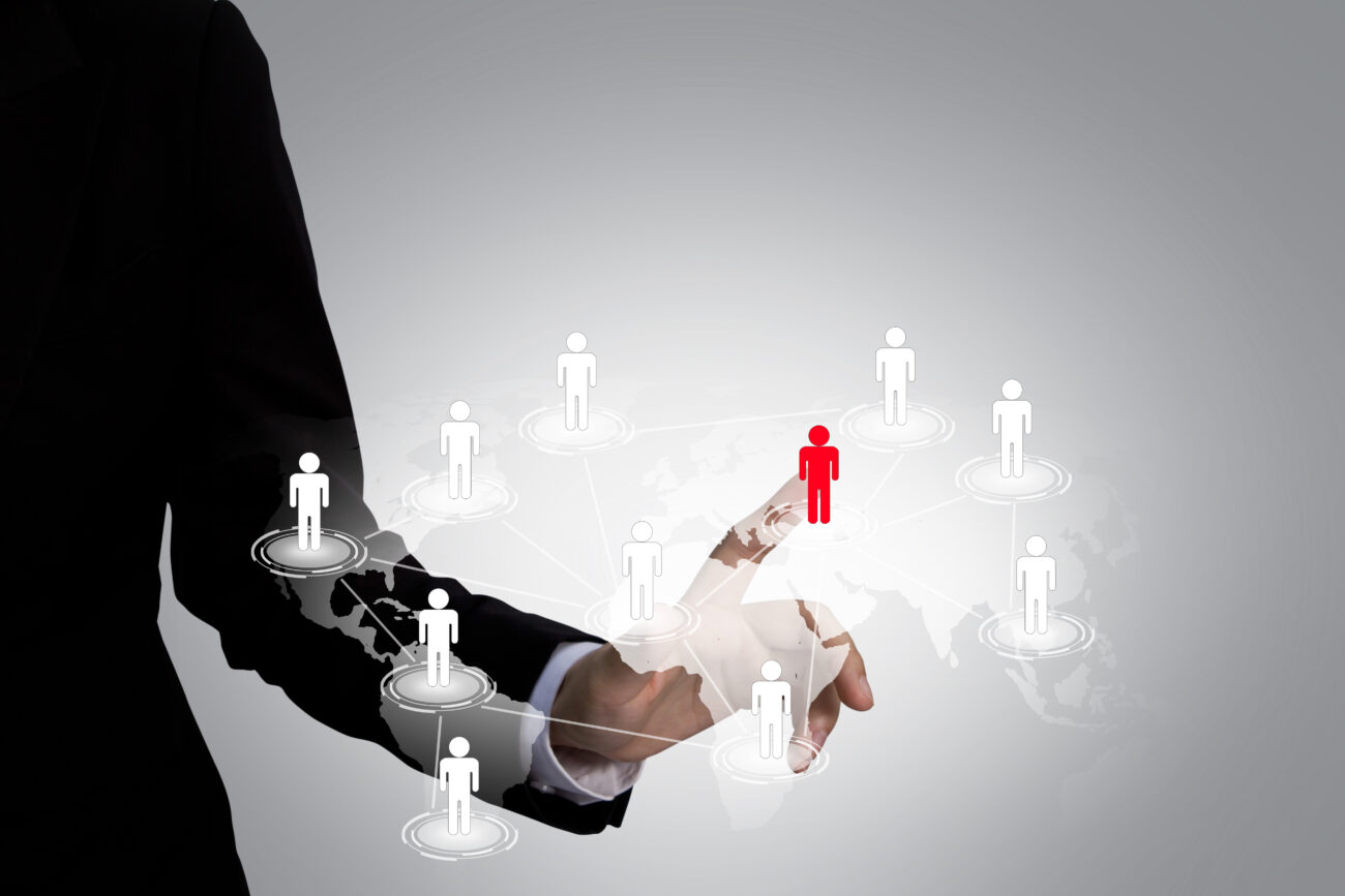 Social Network concept : hand point to social network and world map. Lead generation funnel transforming digital clicks into customers for marketing agencies in Agra and Noida